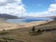 ...à un splendide lac au bleu changeant et comme posé dans un écrin de montagnes. Nous sommes restés un long moment subjugués par ce seul spectacle.